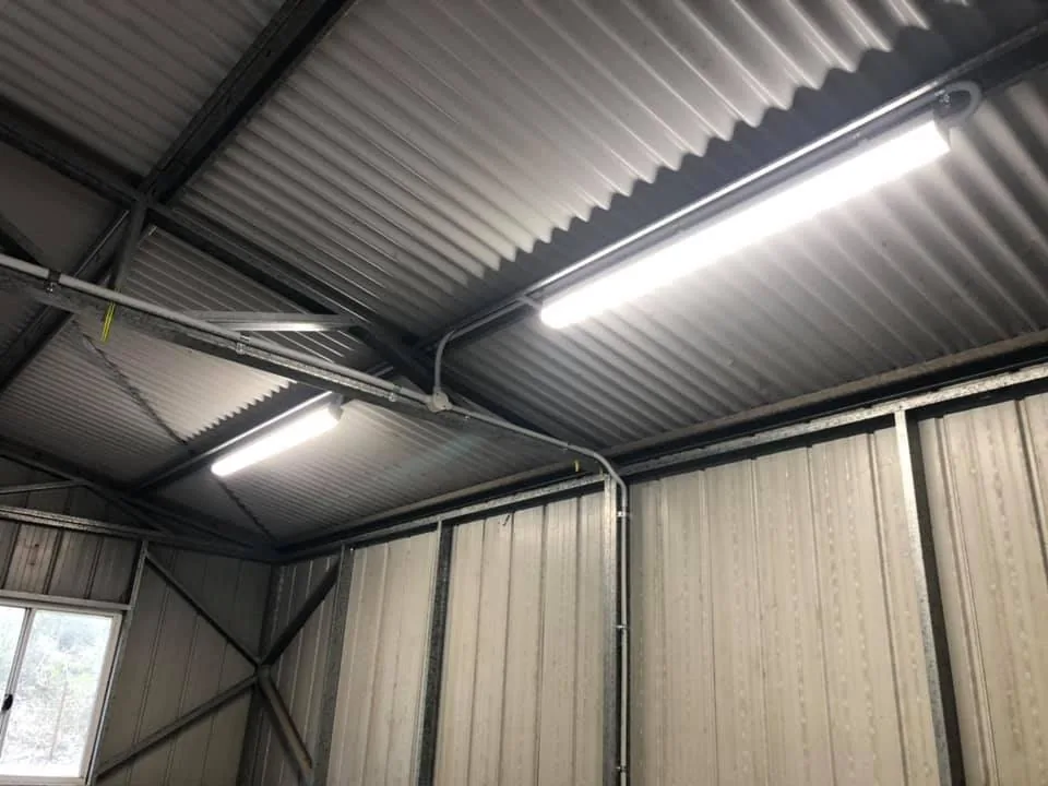 LED batten lights wired inside a steel shed